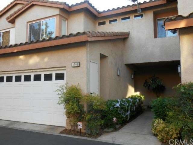 Front Entry and 2 Car Attached Garage.  Very priva