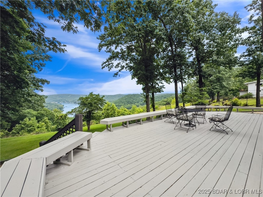 Roomy deck leading to the yard.   Amazing for ente