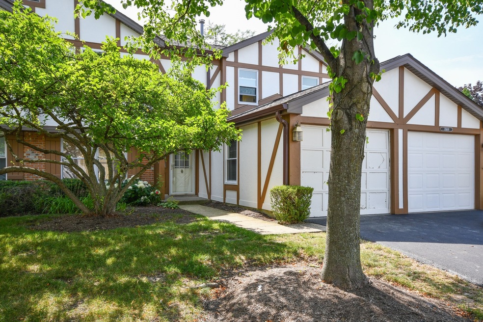 Front Exterior Mature Trees with Greens & Foliage 