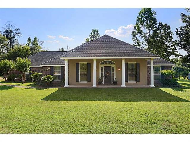 Facade/Exterior Front. Beautiful home on one acre