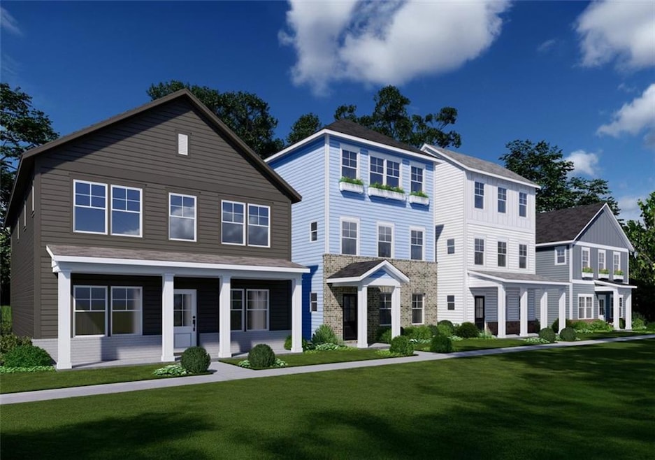 View of front of home featuring a front lawn and a porch