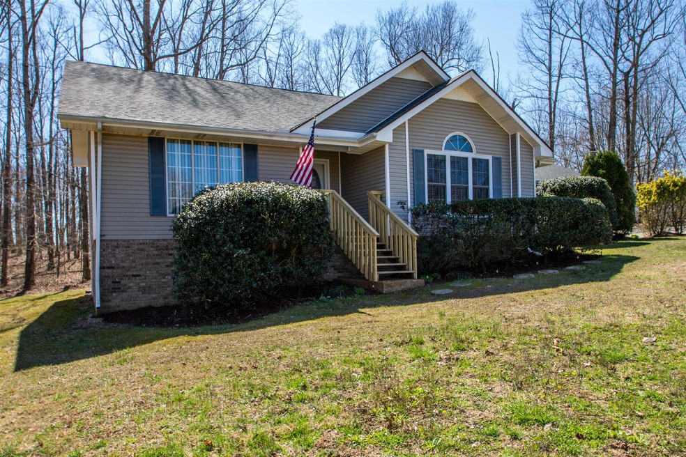 Charming home on a beautiful 3.4 acre lot.