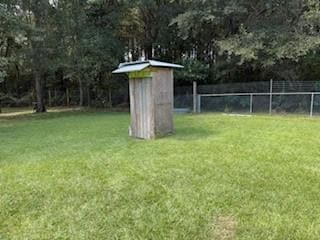 View of yard featuring view of wooded area