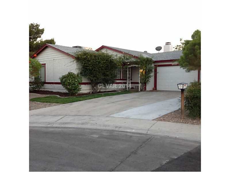 Facade/Exterior Front. Oversized driveway, side of