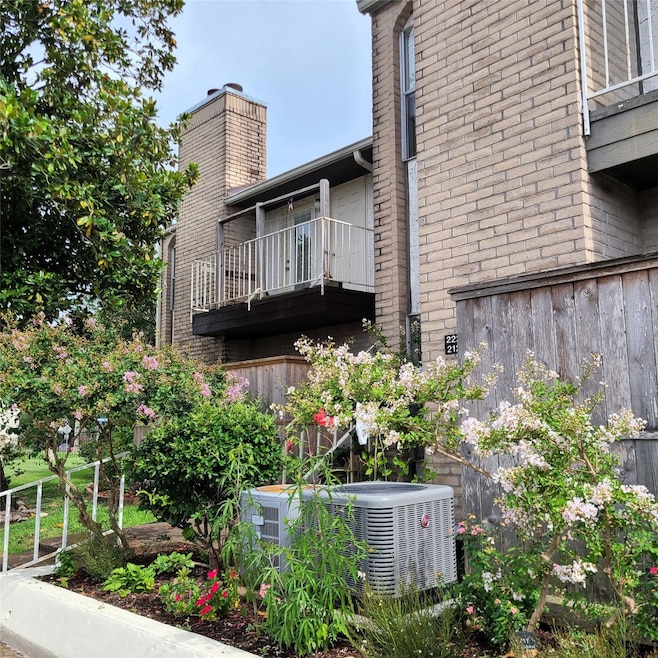 This Second Floor Corner Unit Balcony looks on to