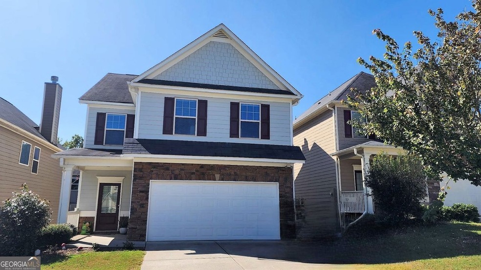 1411 Woodward Down Ct, Buford, GA 30519 - photo 1