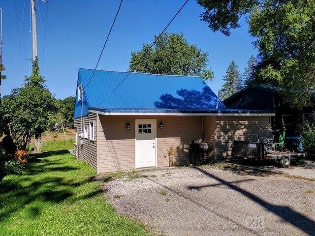 4042 Cobblestone Ct, Beaverton, MI 48612 - photo 1