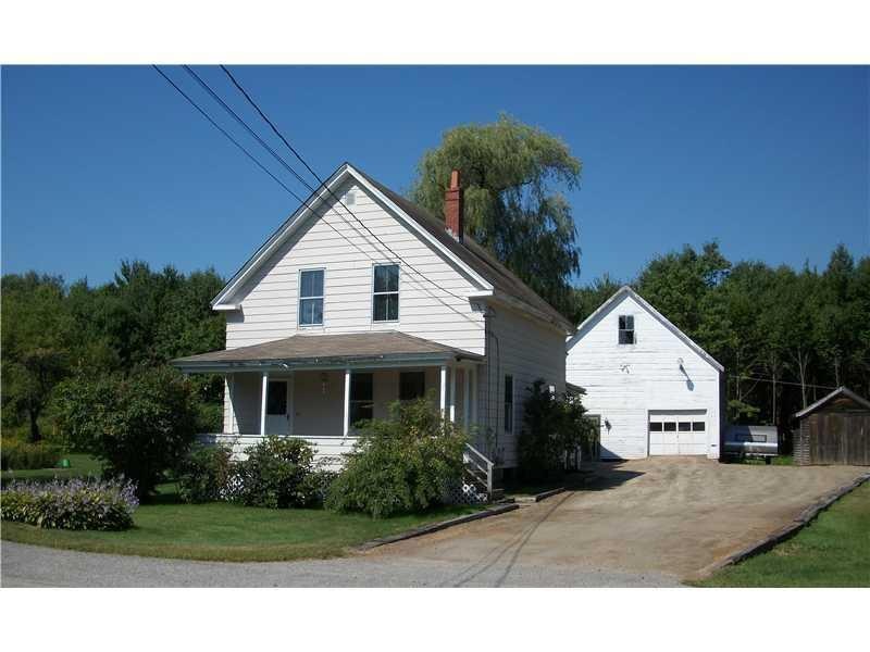 Exterior Front. 1900 Cape with a...