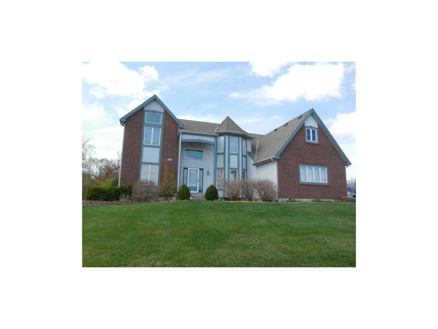 Curb appeal with a huge lush green corner lot and 