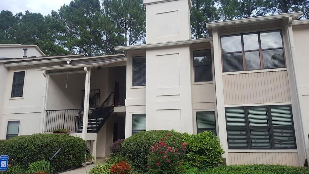 View of building exterior featuring stairway