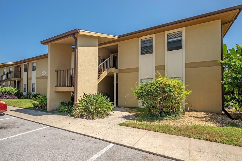 12261 Sailwinds Dr unit 103, Largo, FL 33773 - photo 1