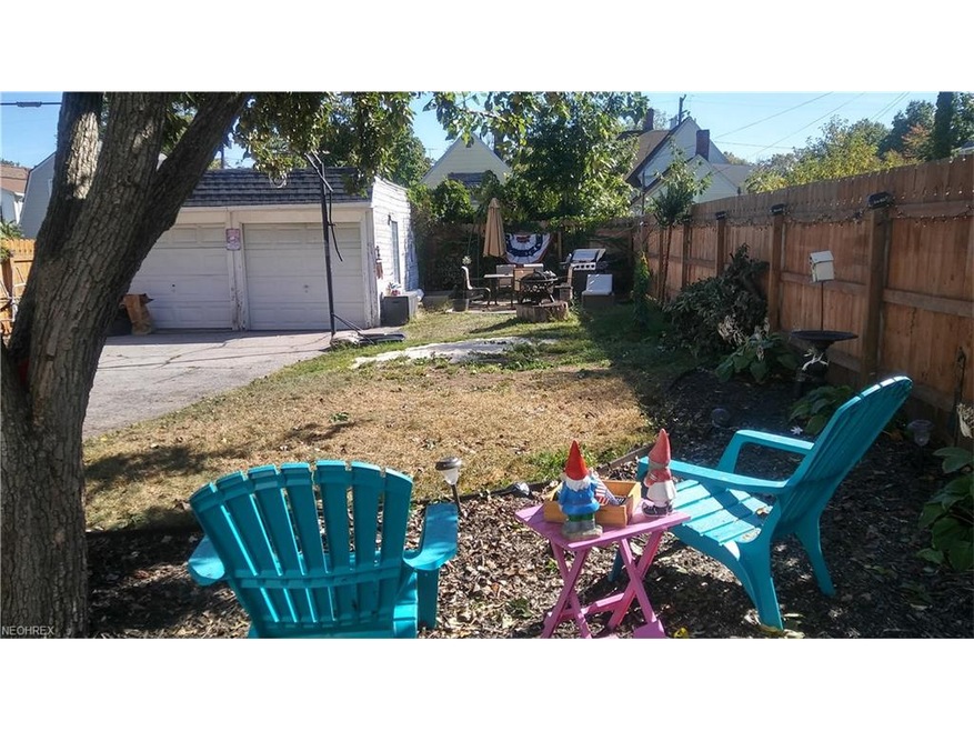 Large back yard, fully fenced in with 2 car garage and patio.