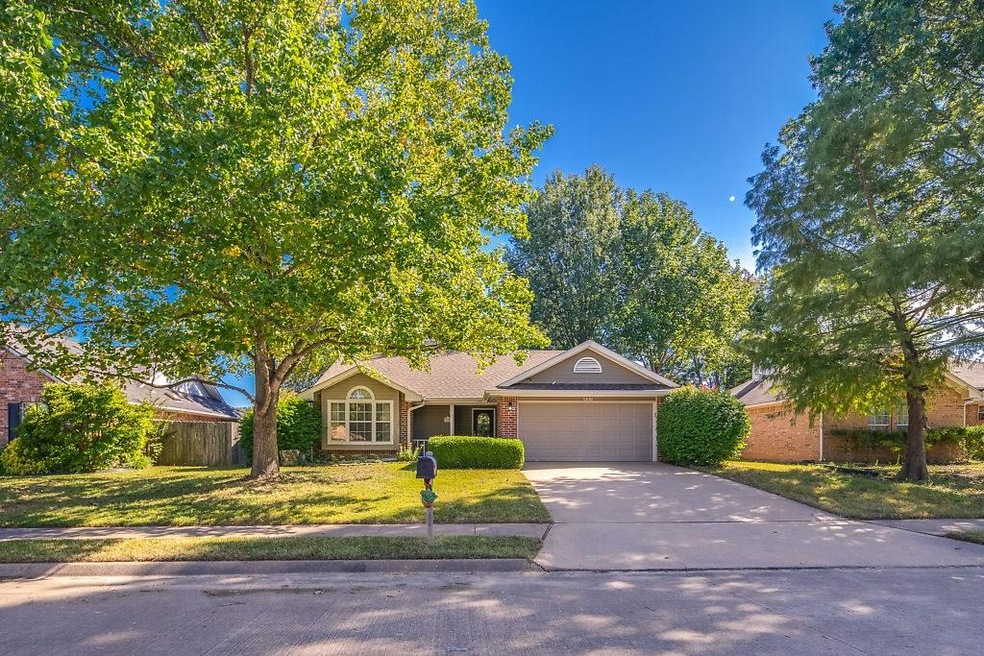 This charming home sits on a quite cul-de-sac in a