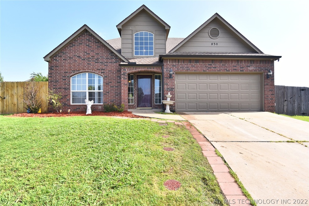 Curb side photo.  House faces south and sits in a