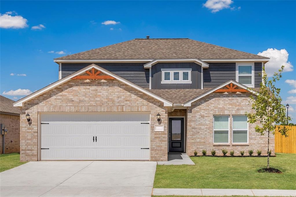 Impressive Curb Appeal! This stunning two-story home features a blend of classic brick and modern finishes, complete with a two-car garage and beautifully landscaped front yard.