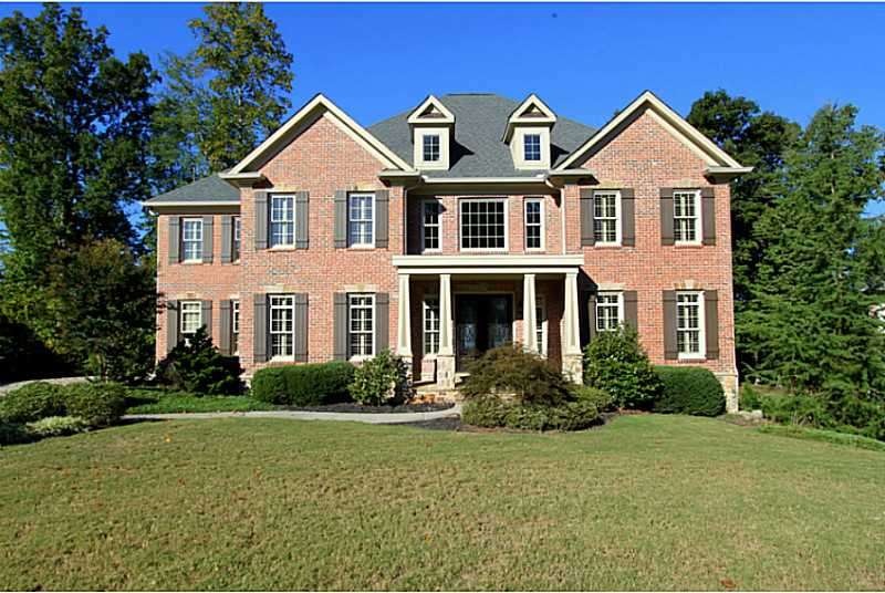Exterior Front. Gorgeous brick and stone home with