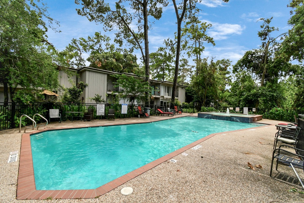 Welcome to 8211 Katy Freeway, Treehouse Condo! The