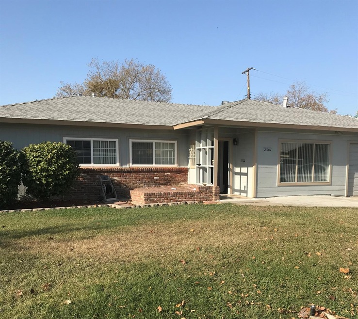 Front view of the home.Roof is 9 yrs old per licensed roofer.New gutters and 2 year roof certification.