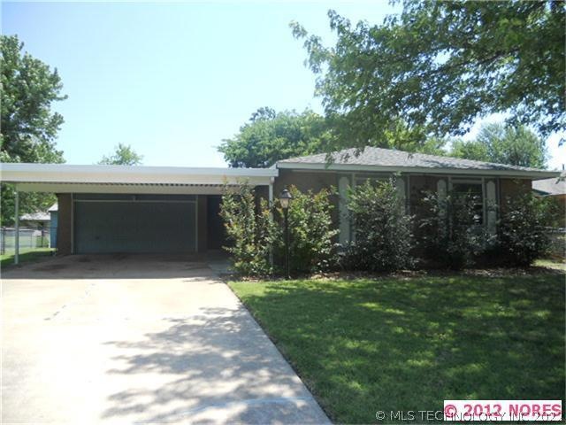 NICE LOT WITH TREES. 2 CAR GARAGE AND 2 CAR CARPOR