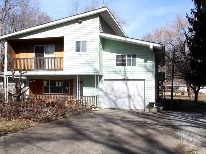 Exterior Front. Unique and very spacious.  Cool front porch for watching the world pass by. 