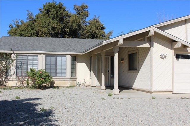 Front view of the home with low maintenance yard.