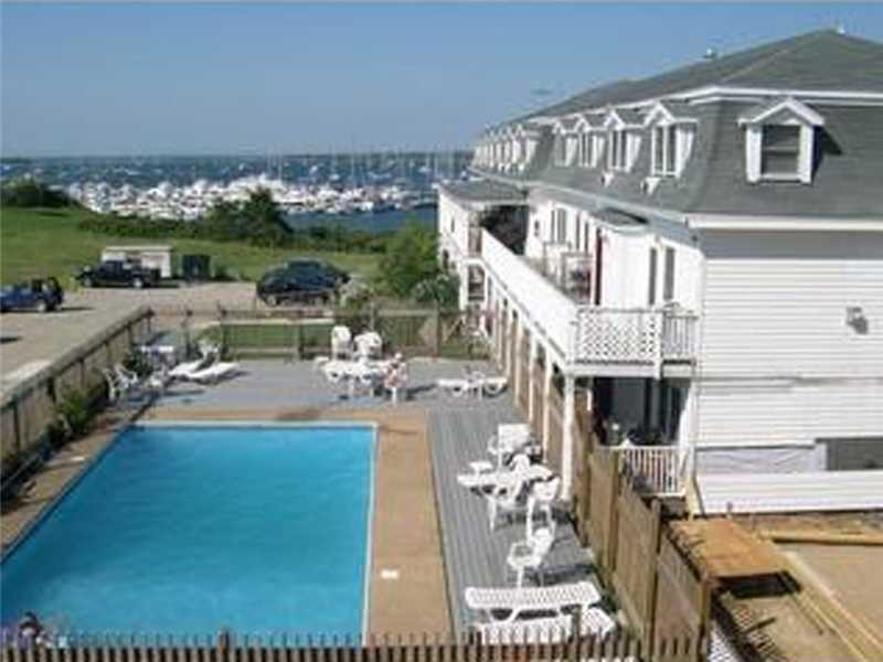 Exterior Front. View of pool, GSP from unit