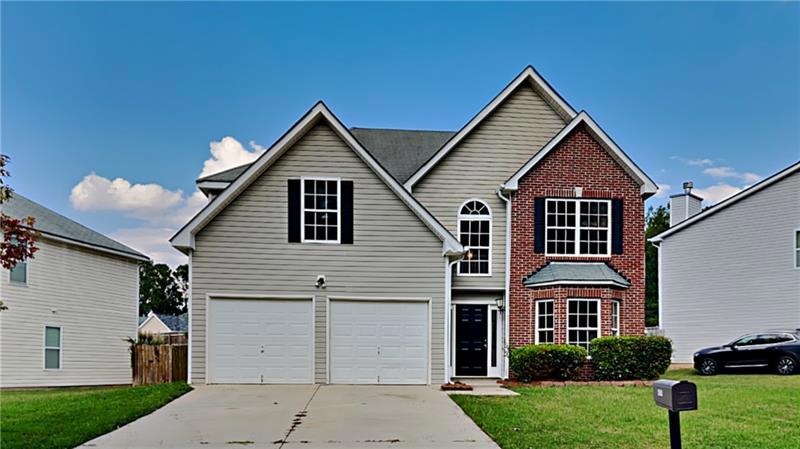 4976 Laythan Jace Ct, Snellville, GA 30039 - photo 1