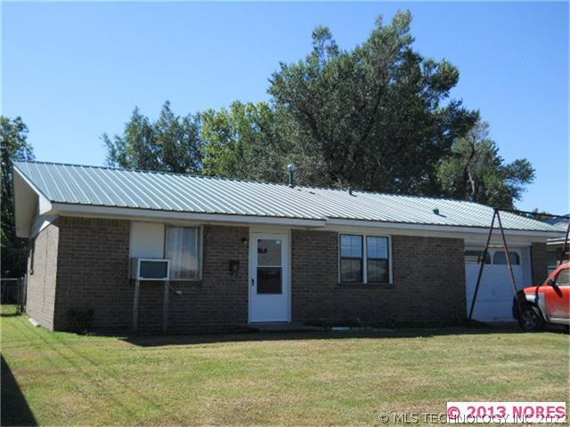 Full brick house with 4 year old metal roof.