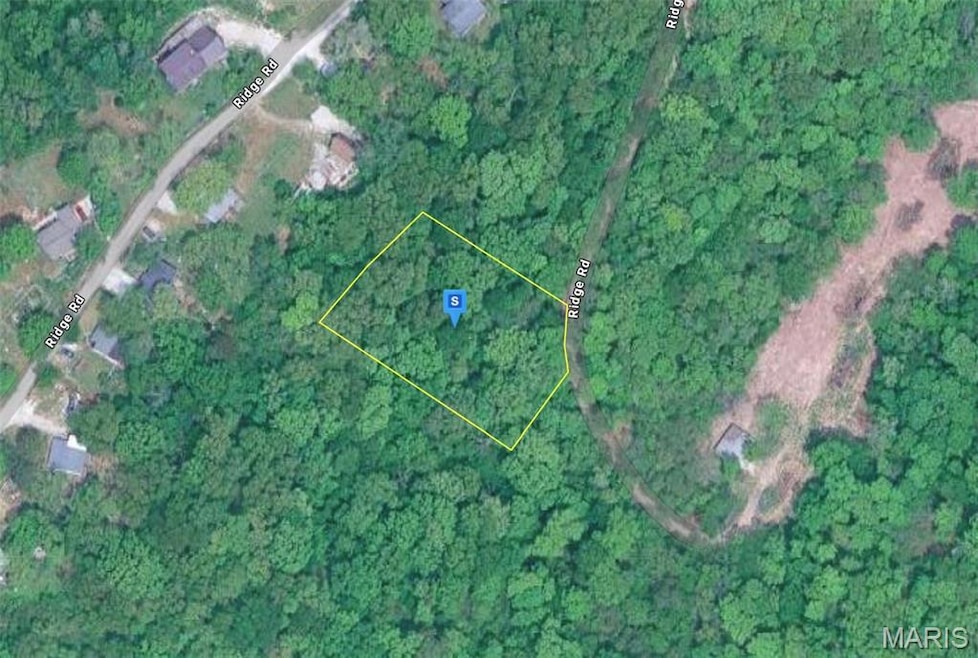 Aerial view of property's location featuring property parcel outlined
