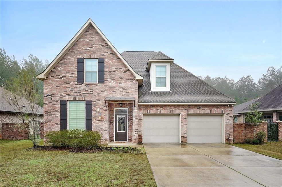 This two story, energy efficient brick home with v