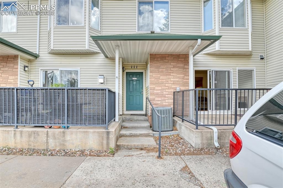 View of exterior entry featuring a porch