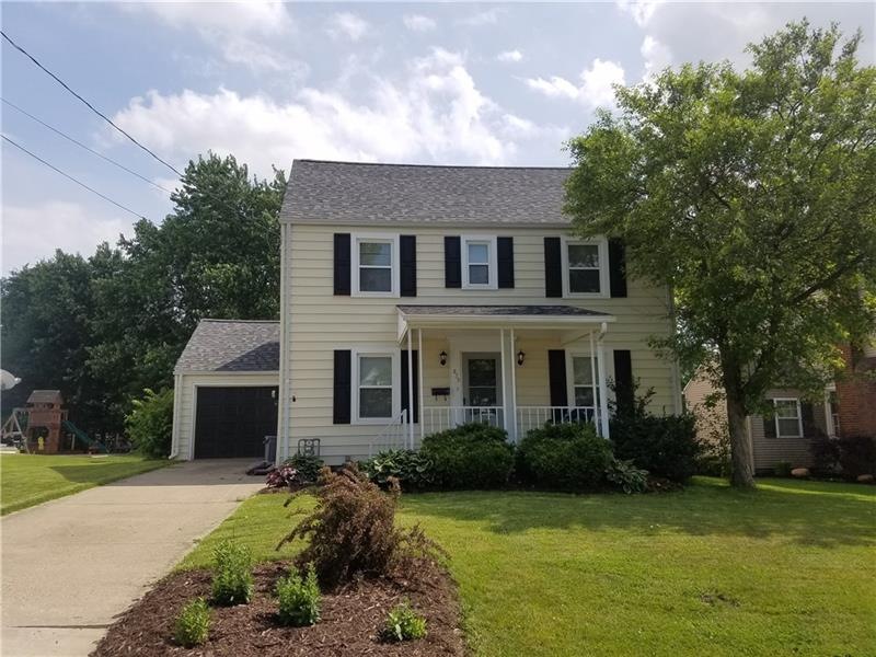 Exterior Front freshly landscaped, new roof, new w