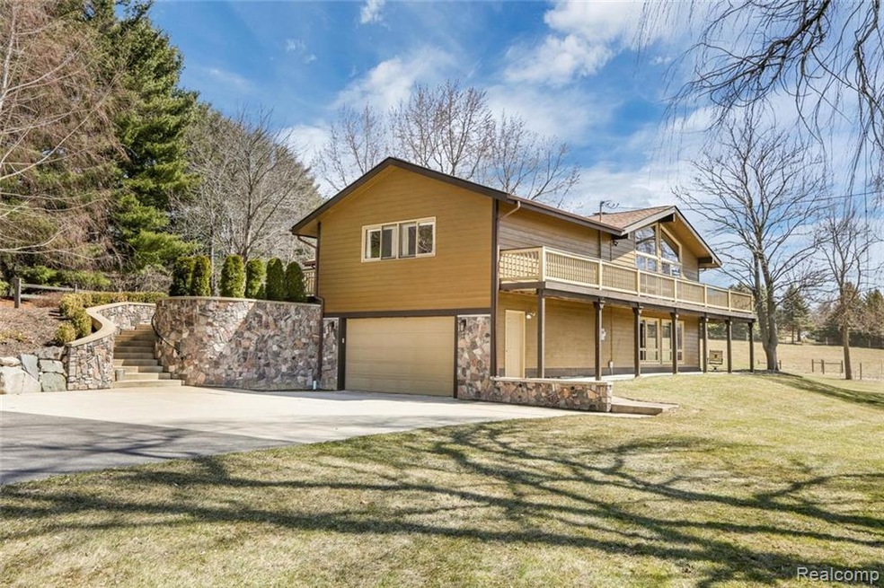 Beautiful, updated raised ranch on a scenic two-ac