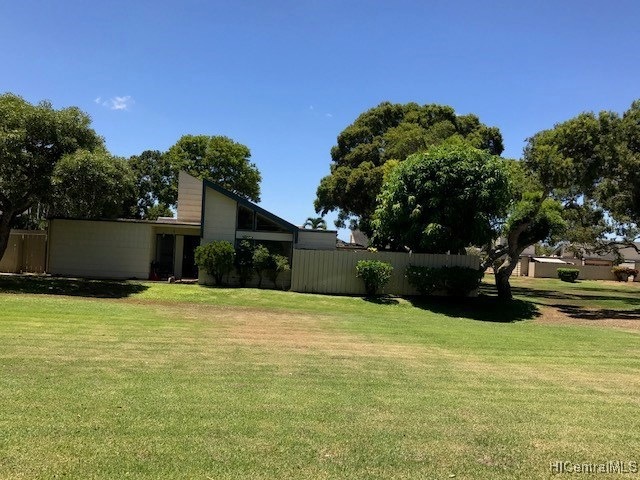 Spacious yard area surrounds this end unit.