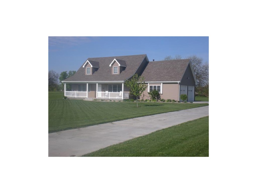 Lovely home on acre lot with full concrete drivewa