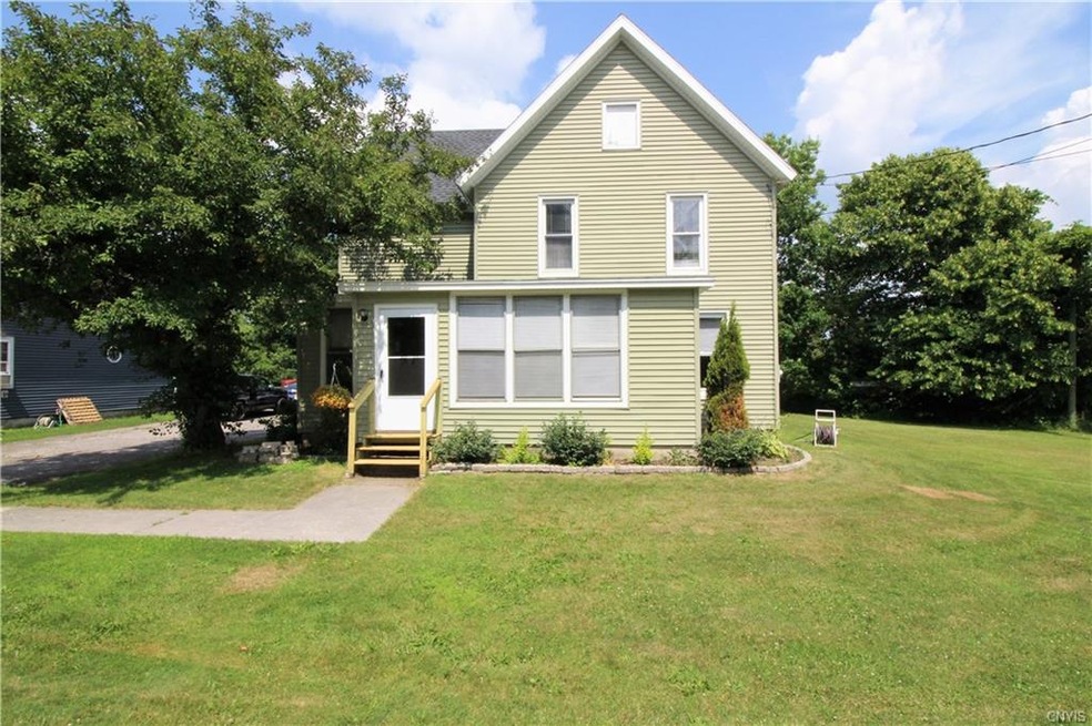 Exterior of home with nice enclosed porch