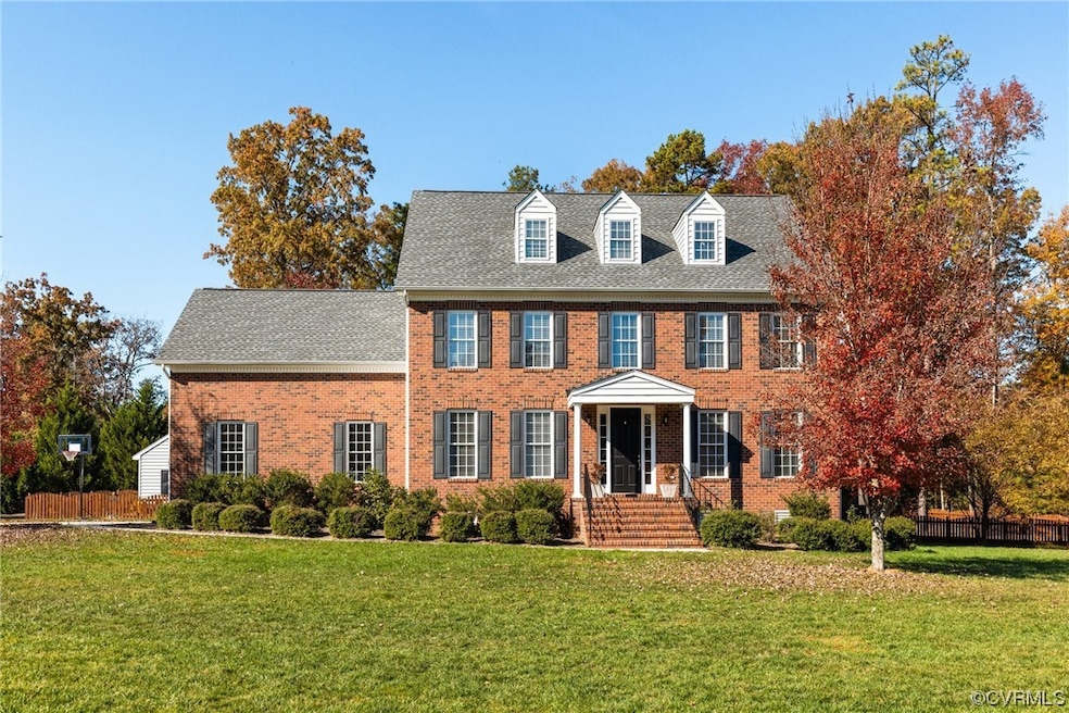 This custom built, brick front home shows like a m