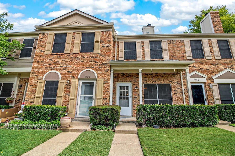 Townhome / multi-family property with brick siding
