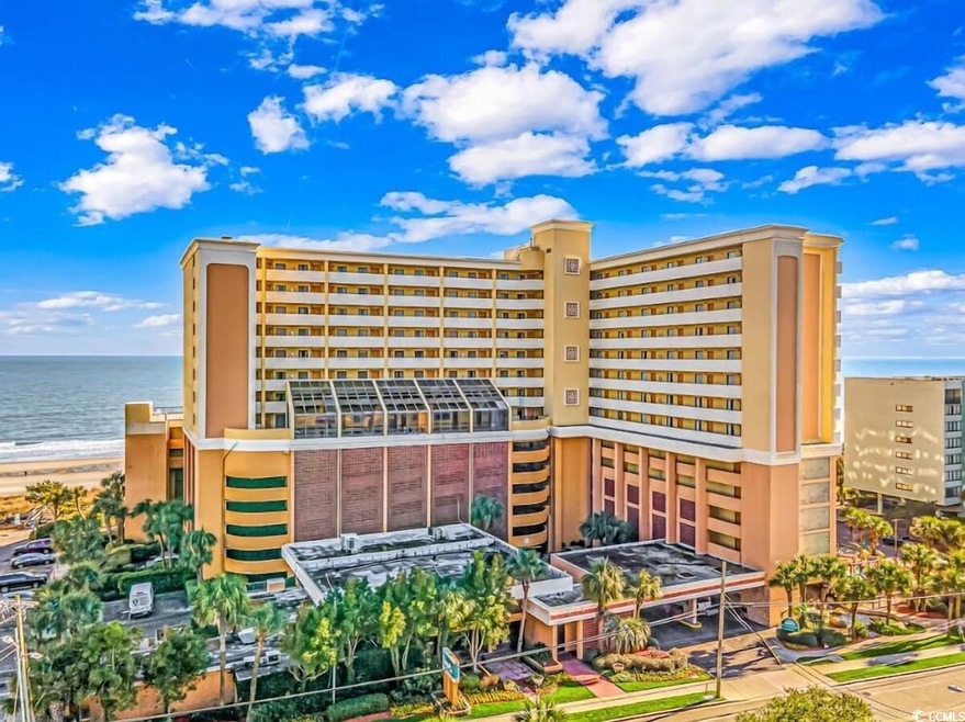 View of building exterior featuring a water view