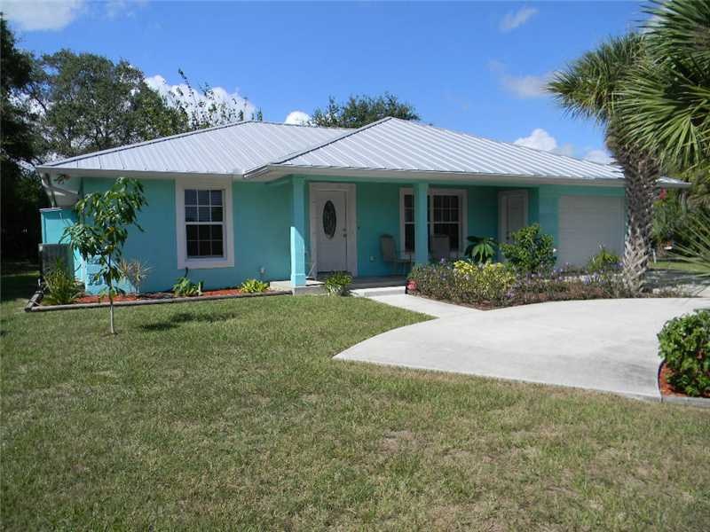 Exterior Front. Extra parking in front of home