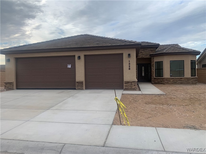 Prairie-style house featuring a garage