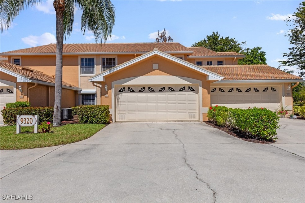 View of front of house featuring a tile roof, an a
