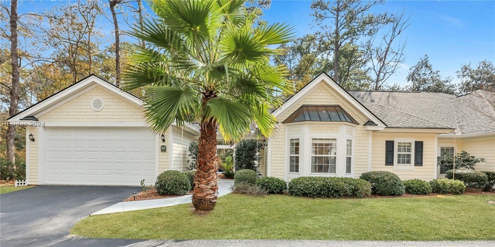 View of front of home featuring a front yard and a