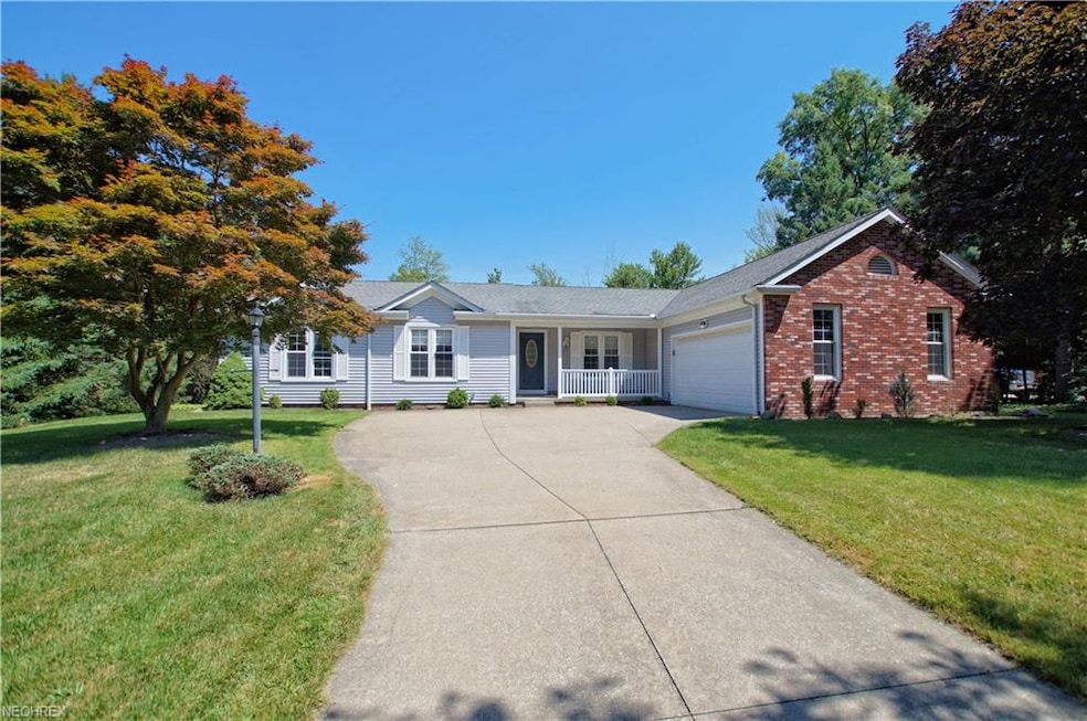 Nestled on a cul-de-sac is this Newly Carpeted and
