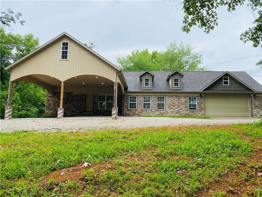 10135 Snavely Rd, Elm Springs, AR 72762 - photo 1