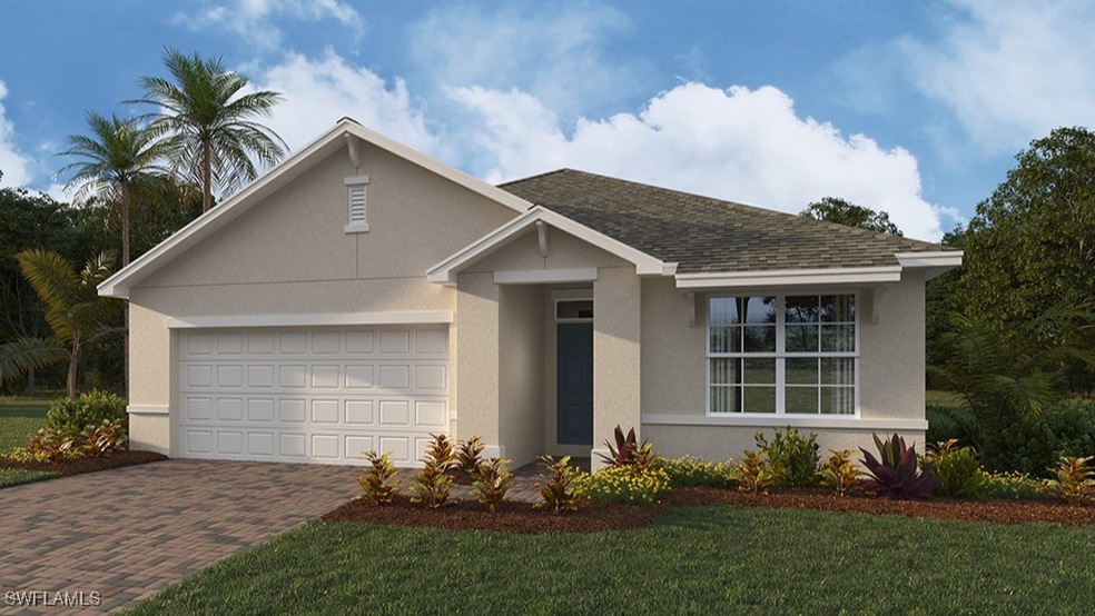 View of front of house with a front lawn and a gar