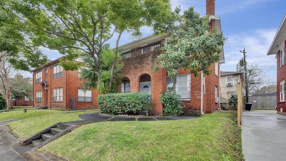 BRICK DUPLEX WITH REAR GARAGE APT