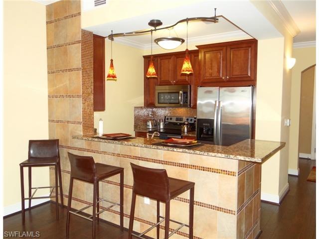 tile and glass block accent wall and backsplash