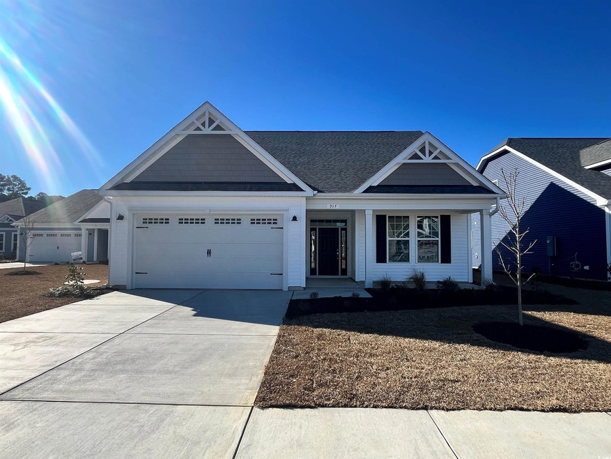 View of front facade with a garage