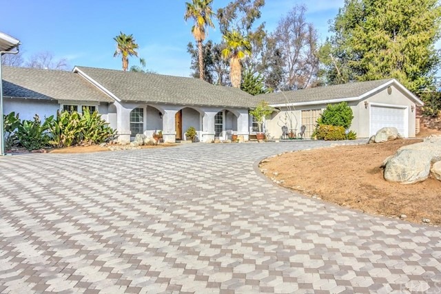 Front of house with thousands spent on the drivewa